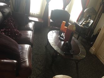 2 couches, 1 coffee table, and 2 end tables