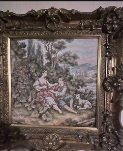 Vintage Victorian subject matter multi color Tapestry in Ornate gold filigree frame.