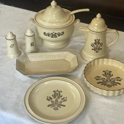 Vintage Pfaltzgraff Village stoneware serving set with floral motif.