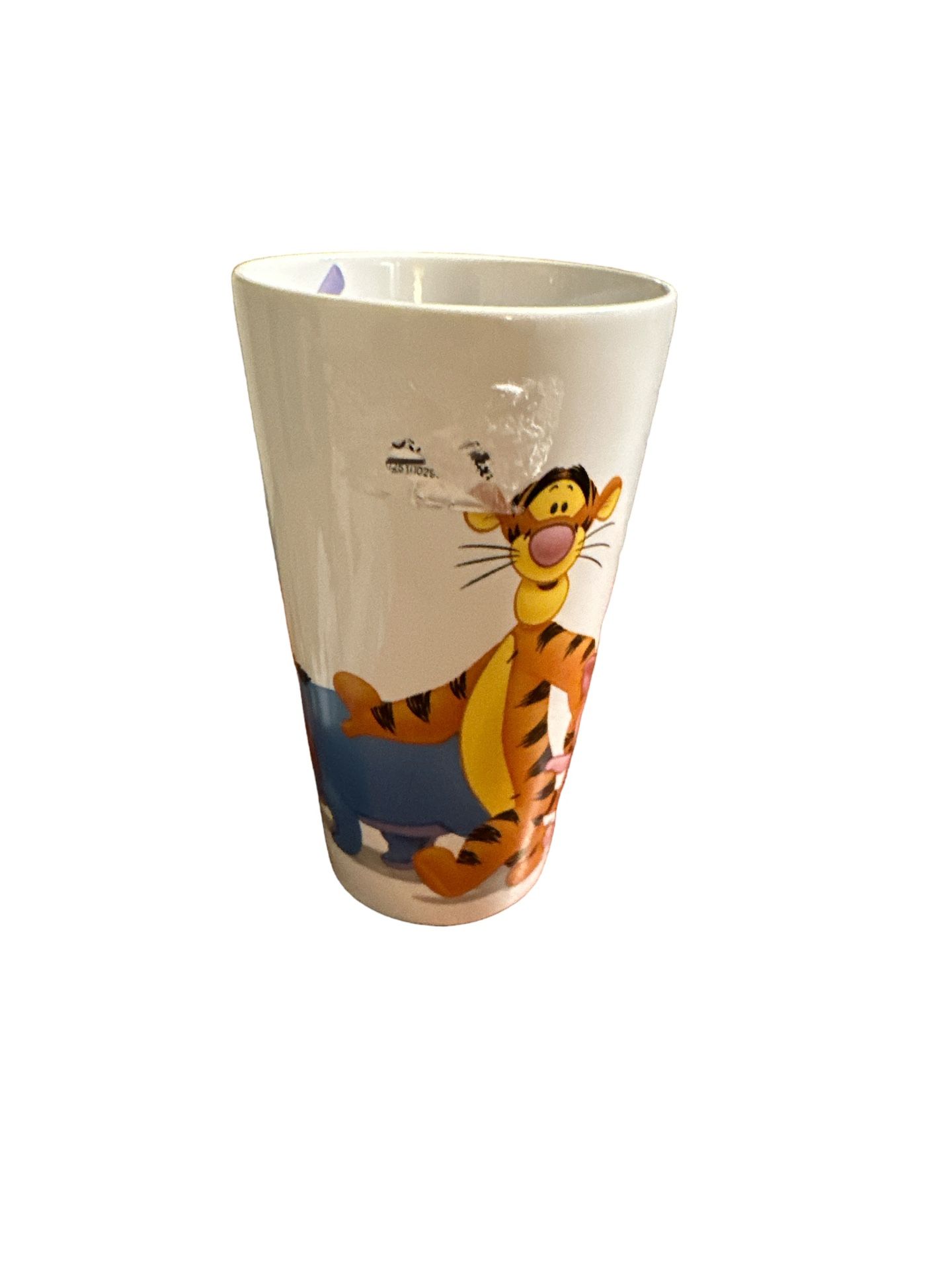 Disney 6” coffee mug of Winnie the Pooh it has a small hairline crack inside cup but not on outside no refunds. T-42