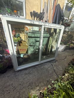 White Vinyl Sliding Window with Glass