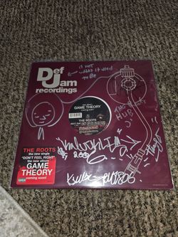 Autograph single vinyl record by The Roots