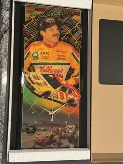 This is a 1998 Terry Labonte Kellogg's limited edition Jebco NASCAR clock.  It features images of NASCAR driver Terry Labonte and his #5 Kellogg's Cor