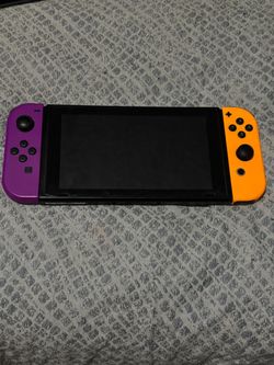 Nintendo Switch with Purple and Orange Joy-Cons