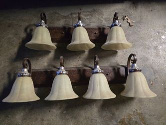 2 bathroom light fixtures