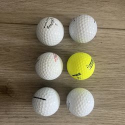  6 Assorted Used Golf Balls  