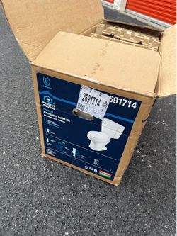 New Project Source Pro-Flush complete toilet kit. Has an elongated white bowl. Still in the box, never installed.