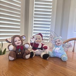 $8 each or all for $20 - Adorable Cuddle Kids dolls.  Collectible porcelain-faced plush dolls from the "Cuddle Kids" or "Anne Geddes" collections with