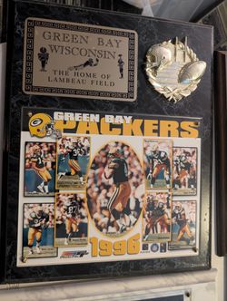 Green Bay Packers Commemorative Wood Plaque With Photographs Mounted.