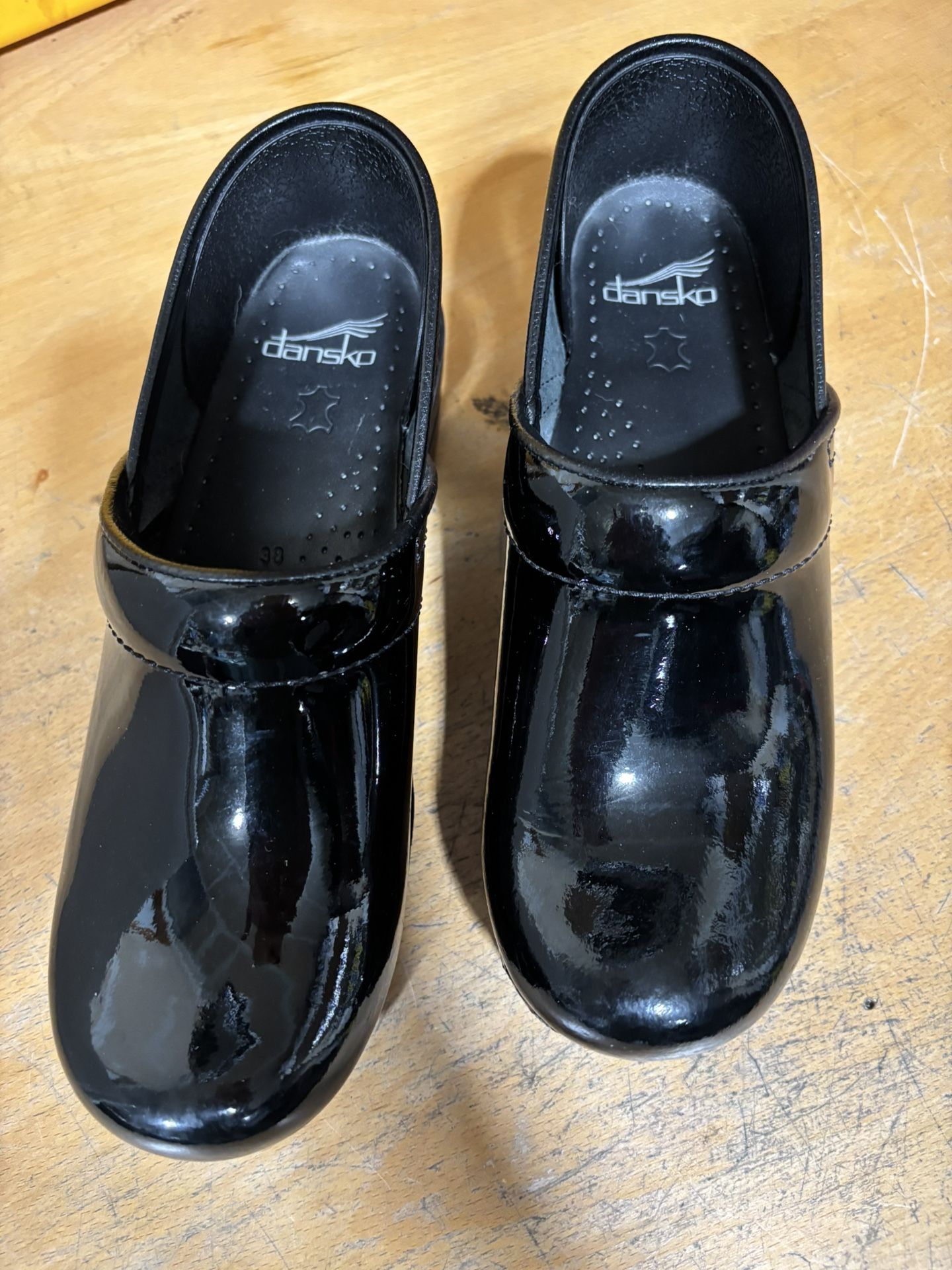 Dansko Black Patten Leather Clogs