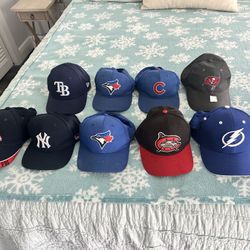 Youth hats previously worn, some new. 