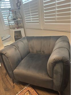 Dark gray armed chair