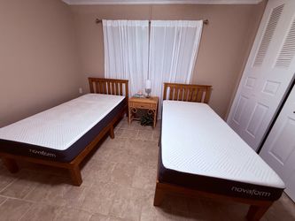 Twin beds with solid wood frames