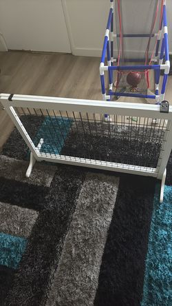 Adjustable dog cage