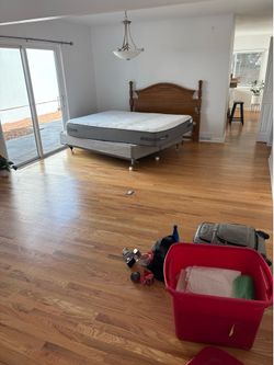 Wooden headboard, mattress, boxspring, and frame
