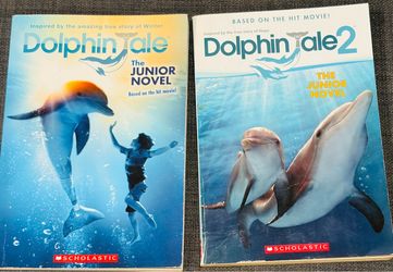 $2- Dolphin Tale 1 and 2  KIDS Books ( Both together $2) Age 5-12
