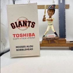 Moises Alou San Francisco Giants bobblehead. It was a stadium giveaway (SGA) item sponsored by Toshiba during the 2006 baseball season