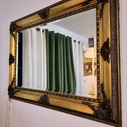 Ornate gold Framed mirror 