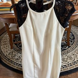 Bisou Bisou cream dress with black lace sleeves Women’s Size 6