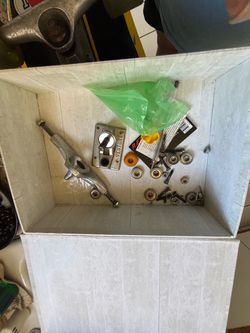 Skateboard stuff including  a pair INDEPENDENT trucks2 used decks with 3 sets of trucks.