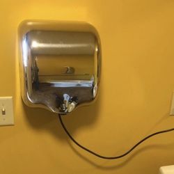 Wall electric hand dryer