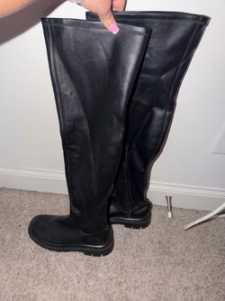 Black thigh high boots