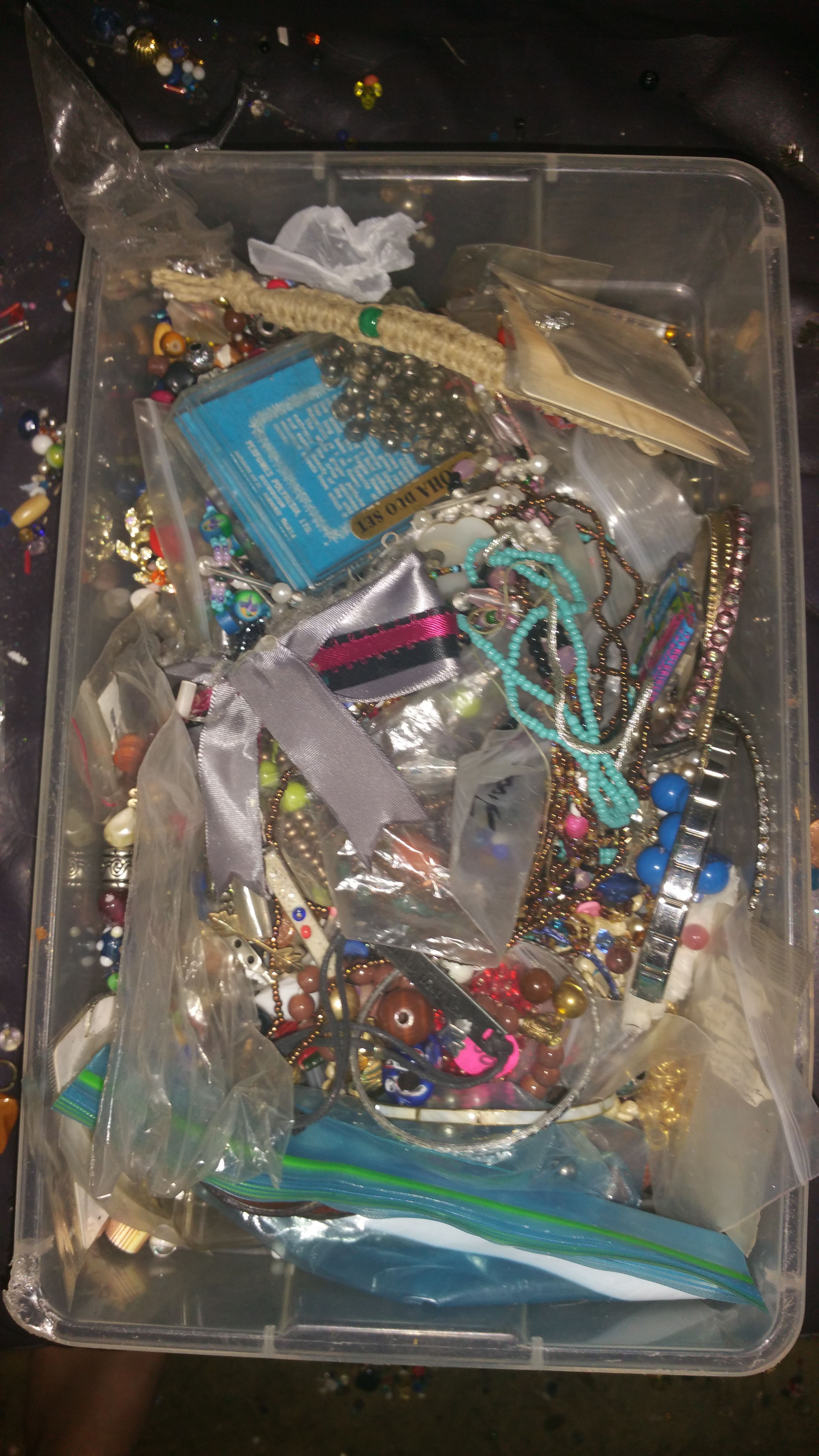 Box of beads and some jewelry