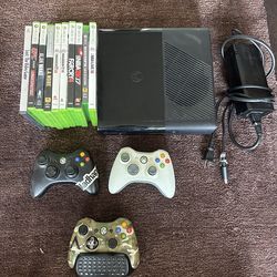 Xbox 360 E w/ controllers and games