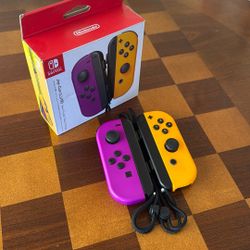 Nintendo Switch Joy Con Neon Purple Orange Excellent Condition
