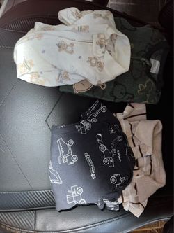 Newborn lot. 2 Sleepers. 2 Onsies.