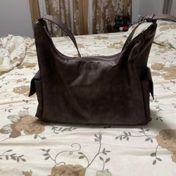 Samo ondoh brown pocket bag in size medium.(127)61