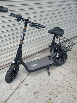 Phantom Gogo Commuter R1 Pro Seated Scooter-15.5 miles per hour Covers 20 miles on a full charge Recharging time is 4-5 hours Rear suspension 450 watt