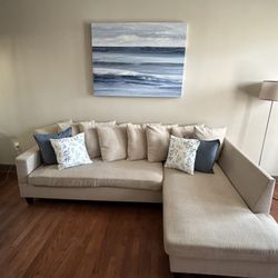 Neutral Beige Sectional + Coastal Canvas + Beige  Bar Stools