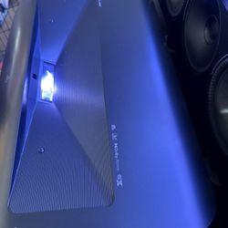 AWOL Vision 3500 Pro UST Ultra Short Throw Projector And Vividstorm 120” ALR Floor Rising Screen