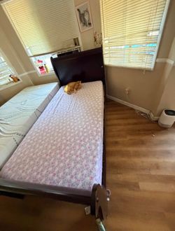 Brown twin bed frame