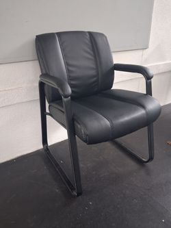 black faux leather chair