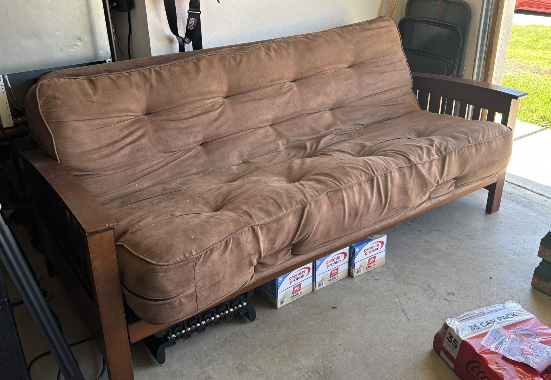 Queen-sized futon with solid hardwood frame and microsuede mattress