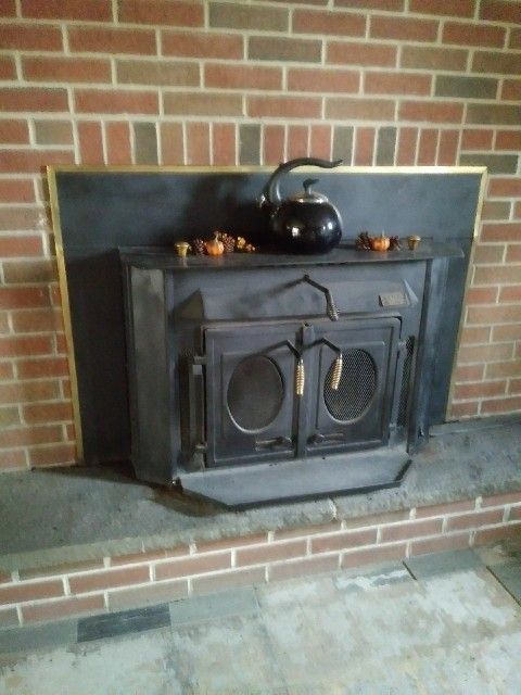 Silent flame wood stove insert