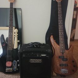 2 Bass Guitars  And A Base Amp 