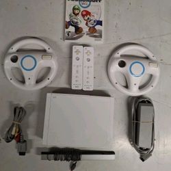 WII complete With Mario Kart And 2 Wheels