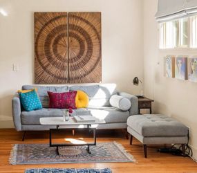 Grey couch and ottoman