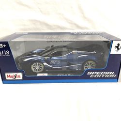 Mint Condition New In Box Scale 1/18 Diacast (Maisto) Ferrari FXXK Evo No. 27 Toy Car. Retails for $50.