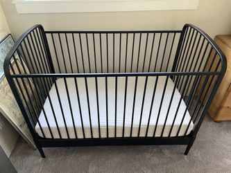 Larkin black metal store crib