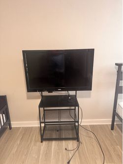 Sanyo TV (40”) plus TV stand