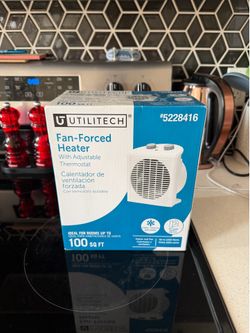 Utilitech 1500 -Watt Fan Compact personal Indoor Electric Space Heater with Thermostat