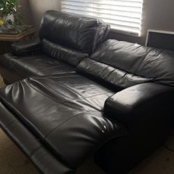 Reclining brown leather couches