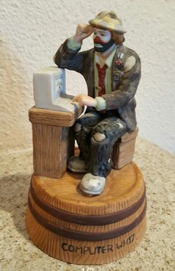 Vintage Emmett Kelly Jr Figurine "Computer Whiz" with stand. This vintage collectible is from flambr