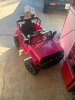 Power wheel pink jeep