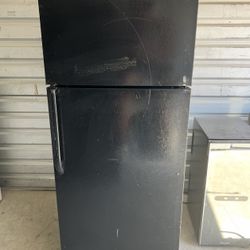 Black GE Refrigerator And Freezer
