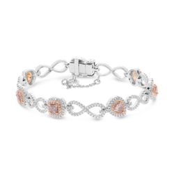 Designs 18K White and Rose Gold Natural Pink Diamond Bracelet 🥰🤙🏾 18K White and Rose Gold Halo Natural Pink Diamond Bracelet featuring 7 natural Pi